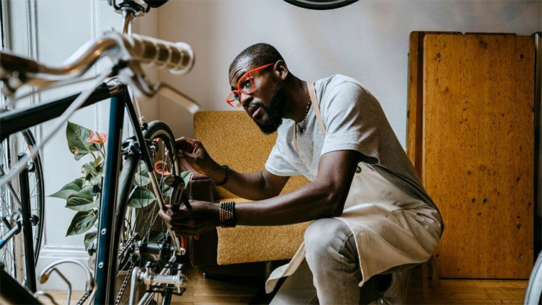 business owner fixing a bike