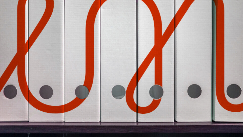 binders with virgin money loop logo on them