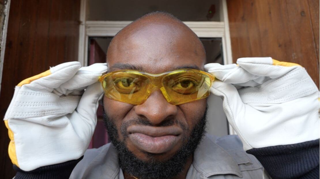Ola with his safety glasses and gloves