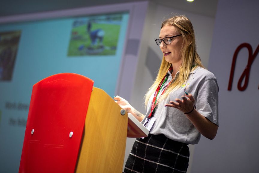 Sarah sharing her journey at the Young Change Makers Fellowship Programme graduation