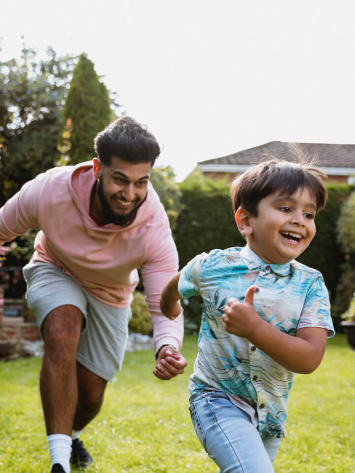 family playing in garden