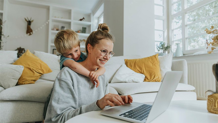 Mother and child using a laptop