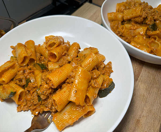 Red pesto sausage pasta with courgette