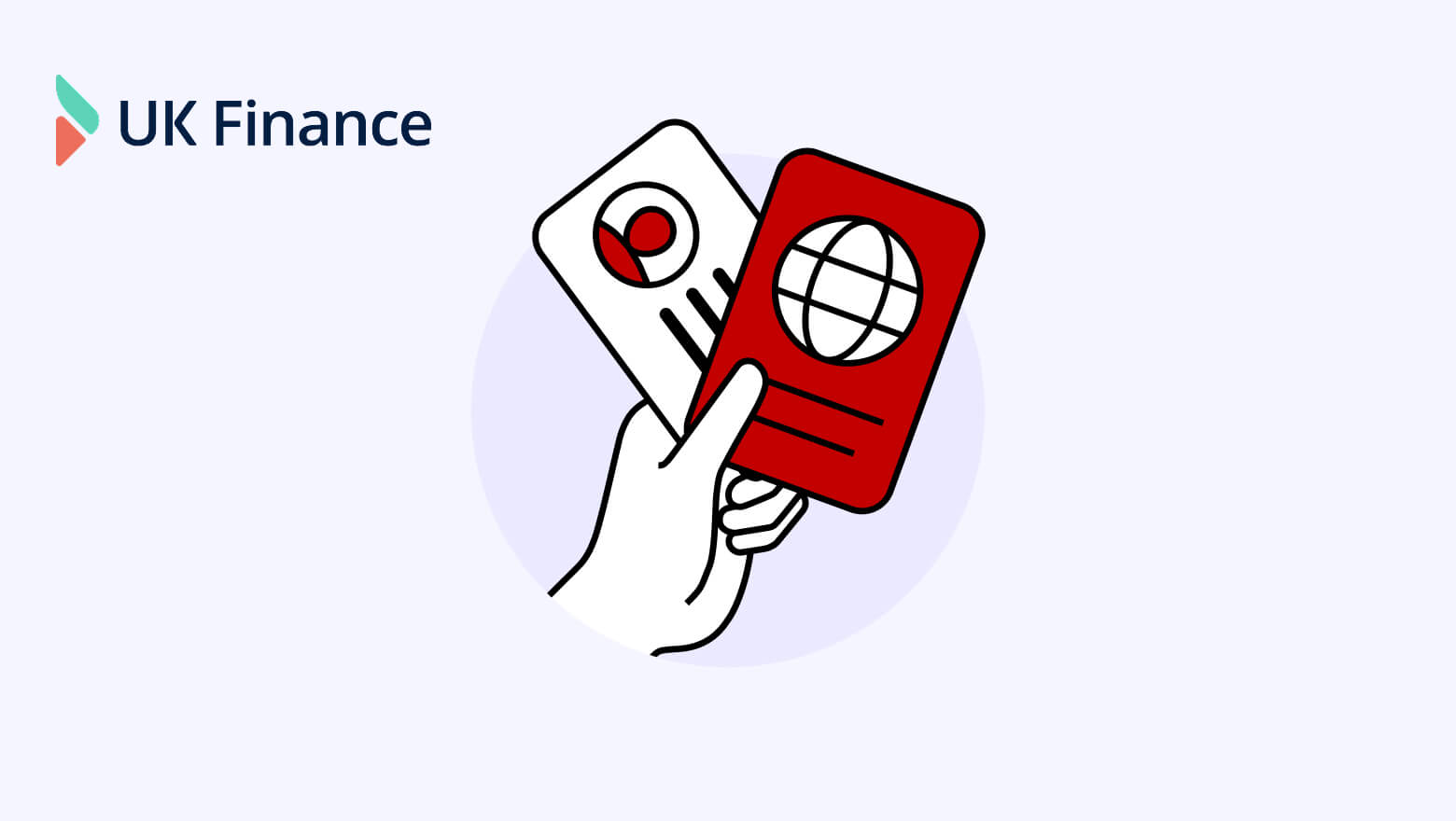 a hand holding two cards